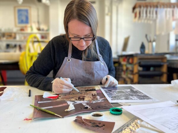 A Heatherleys printmaking student in the printmaking studio