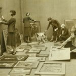 Archive photo of students and tutors working on an exhibition at Heatherleys in 1931..
