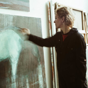 Eugenie Vronskaya painting in her studio