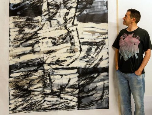 Post Diploma graduate Miguel Sopena with his painting Mycenae 5, oil impasto on unstretched canvas, 200x150 cm at The Stone Space.