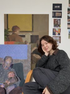 Artist and Heatherleys Portrait Diploma graduate Kayoon Anderson in her studio with her paintings