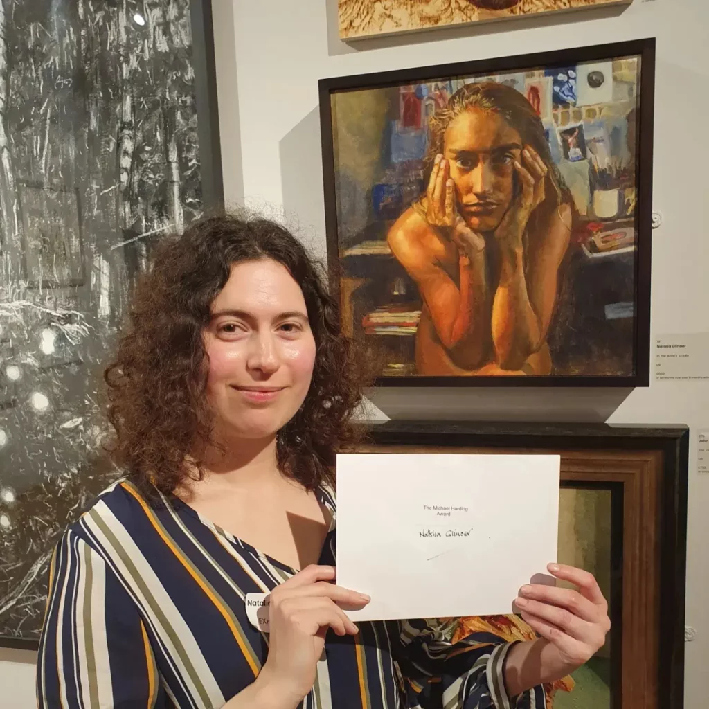 Natalia Glinoer with her painting In the Artist’s Studio