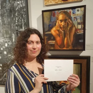 Natalia Glinoer with her painting 'In the Artist’s Studio'.