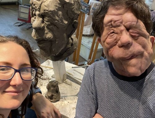 Adam Pearson and sculptor Keziah Burt and her portrait bust of Adam.