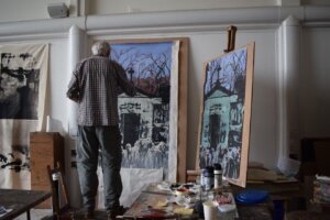 Student on the Post-Diploma in Figurative Painting working on a painting in the studio.