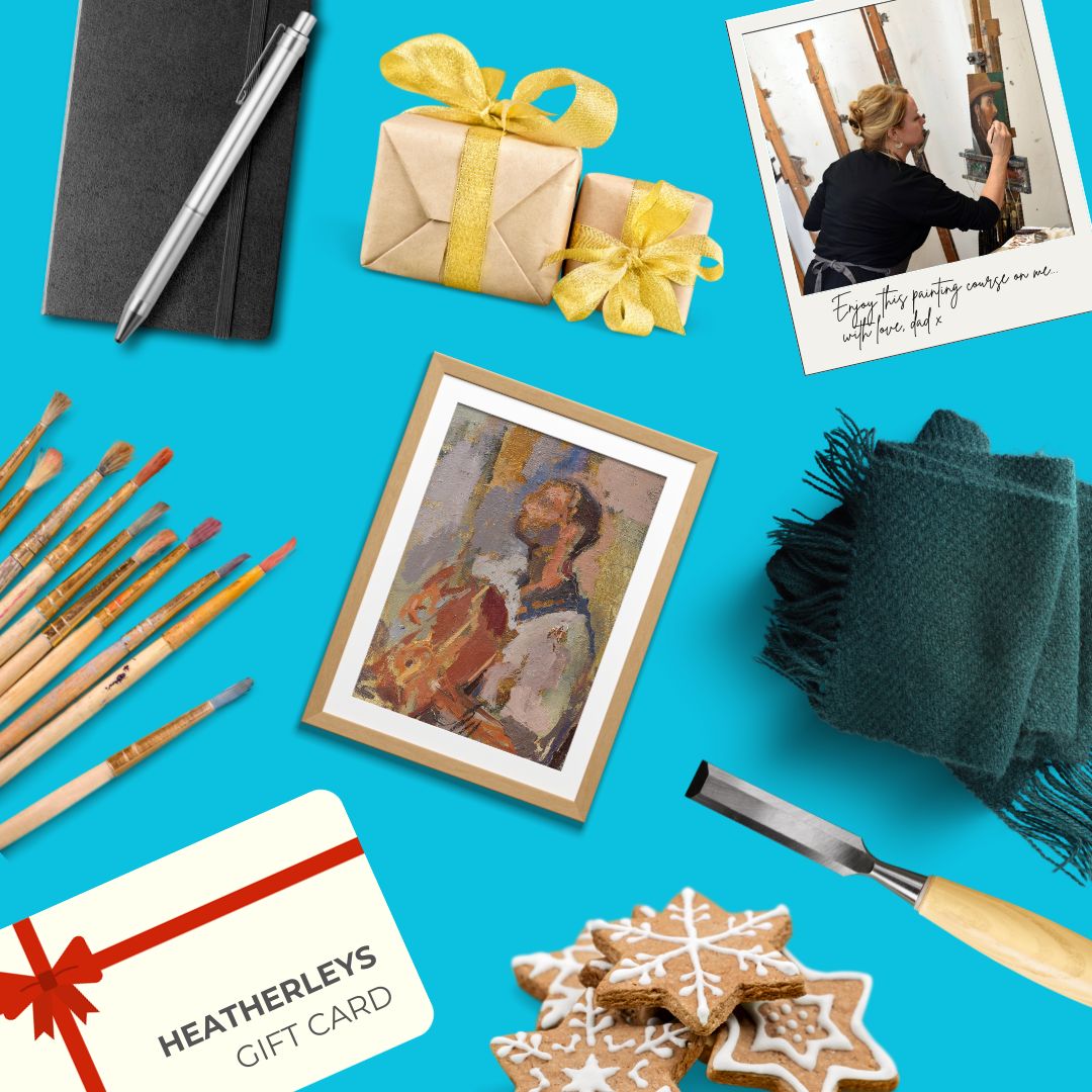 Gift ideas on a blue background: A black note book and pen, paintbrushes, a gift card, sugar cookies, a painting, a teal scarf, a chisel, a photo of a woman painting.
